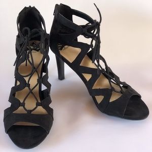 Black adjustable tie heels
